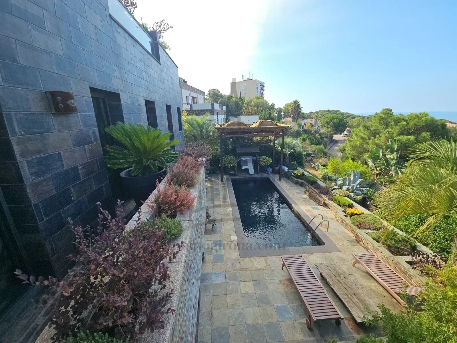 Villa zen con piscina, spa y vistas al mar en Lloret de Mar